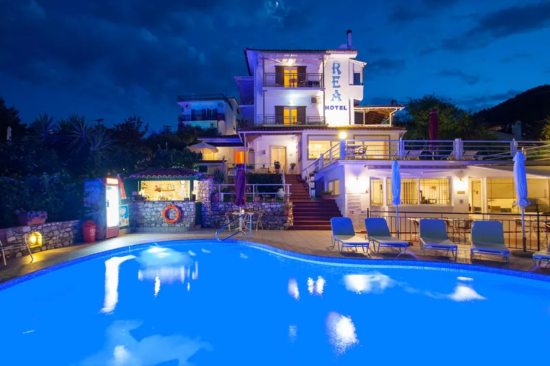 The pool and the hotel after dark