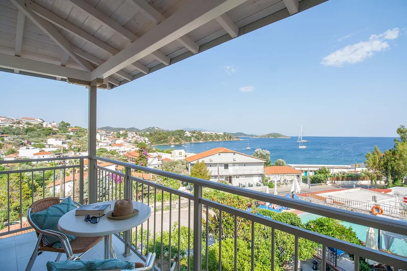 A studio balcony with a view of the sea